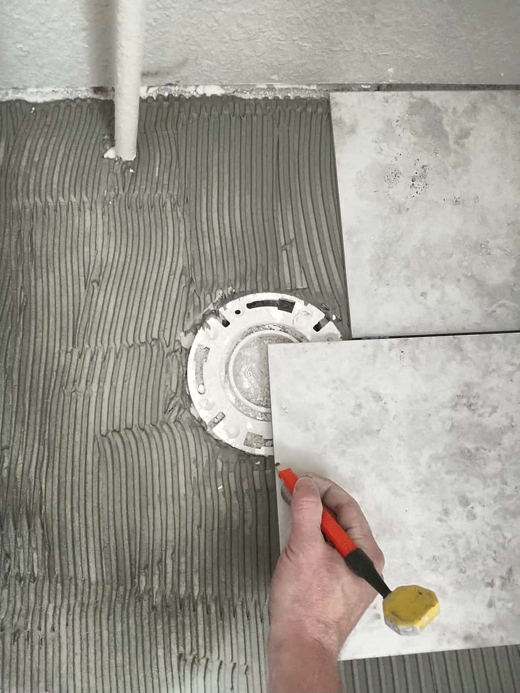 Measuring next tile for toilet flange