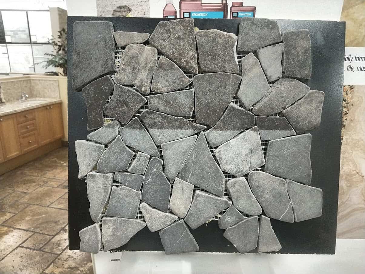 Stone sealed with enhancing sealer vs non-enhancing
