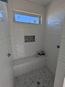 Master shower grouted and finished