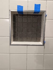 Tile in niche installed