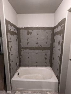 Basement tub walls taped and mudded