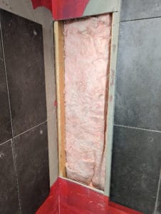 Cutting the niches into the master shower