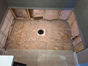 Homeowner has installed drain and we're ready to pour the shower pan