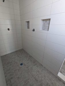 Master shower grouted and finished