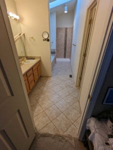 Master bathroom floor, tub, and shower finished2