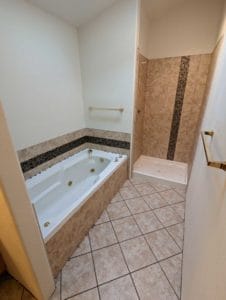 Master floor, shower, and tub set