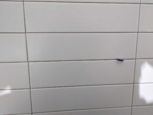 Tiles are not consistently sized, so a straight lay is hard to make look good