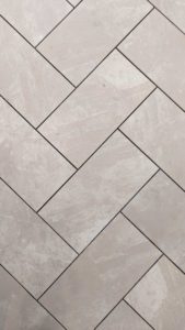 Closeup of ungrouted herringbone pattern