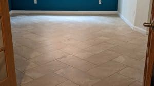 Finished basement bathroom herringbone tile floor2