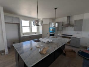 Kitchen backsplash grouted, caulked, and finished