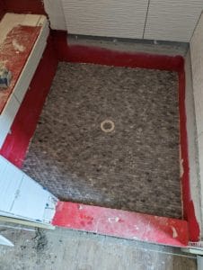 Marble ellipses installed on shower floor