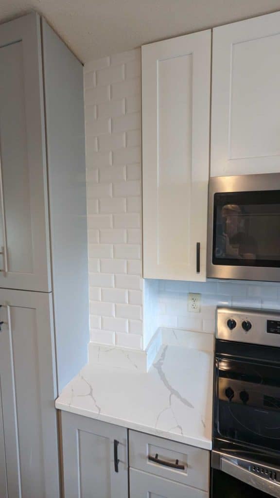 Backsplash grouted, caulked, and finished2