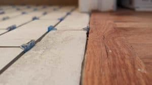 Closeup of joint from tiles to hardwood