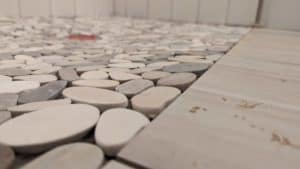 Closeup of shower floor pebbles