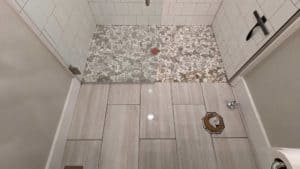 Guest bath floor tiles grouted