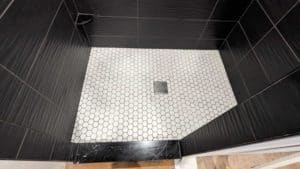 Master shower floor grouted and finished