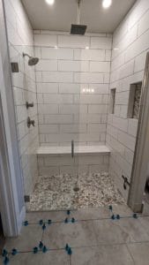 Master shower repaired and awaiting grout