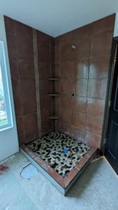 Shower is fully set except for the pieces touching the flooring