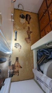 Black adhesive under vinyl tiles could be asbestos - can't demo more2