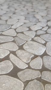 Closeup of shower floor pebbles