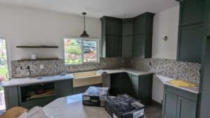 Kitchen backsplash partially installed