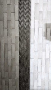 Herringbone mosaic band installed