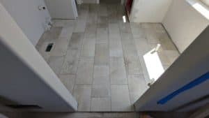 Master bath floor grouted and finished