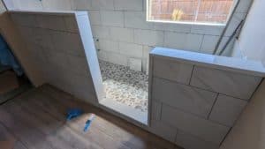 Installed solid caps and sills for walls, niche, curb, and window