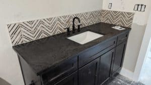 Basement bath backsplash finished