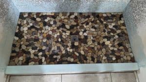 Basement shower floor pebbles set