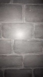 Main level tub surround tile closeup