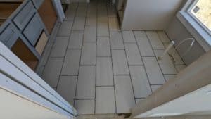 Master bath floor tiled