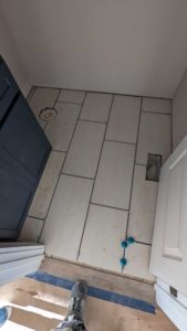 Powder room floor tiled