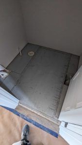 Powder room floor underlaid