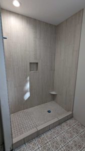 Basement shower - grouted as much as possible before running short on grout