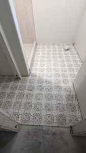 Basement bath floor grouted and finished