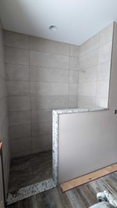 Grouted everything that is set in the master shower