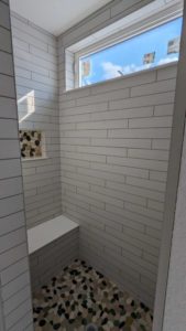 Master shower grouted and finished