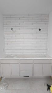 Master backsplash grouted, caulked, and finished