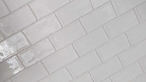 Closeup of kitchen backsplash grouted tiles