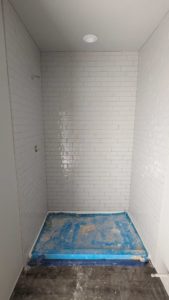 Guest shower grouted and finished