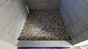 Master shower floor grouted and finished
