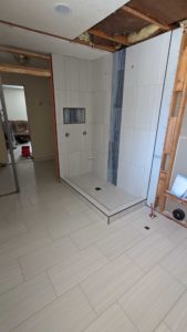 Master floor and shower grouted and finished