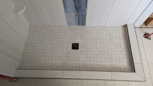 Master shower floor grouted and finished