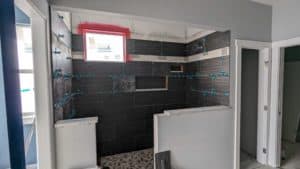 More tiles installed in master shower