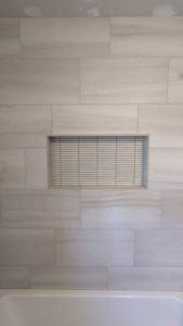 Grouted and finished niche
