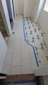 Finished setting the rest of the master bath floor