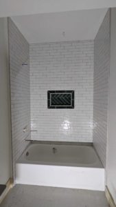 Grouted and finished tub surround