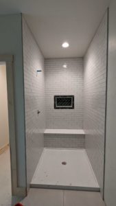 Grouted and finished basement shower surround