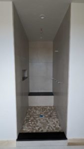 Grouted and finished master shower